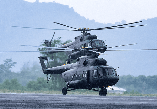 two military helicopters